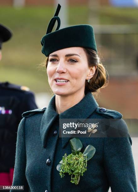 Catherine, Duchess of Cambridge attends the 1st Battalion Irish Guards' St. Patrick's Day Parade with Prince William, Duke of Cambridge at Mons...