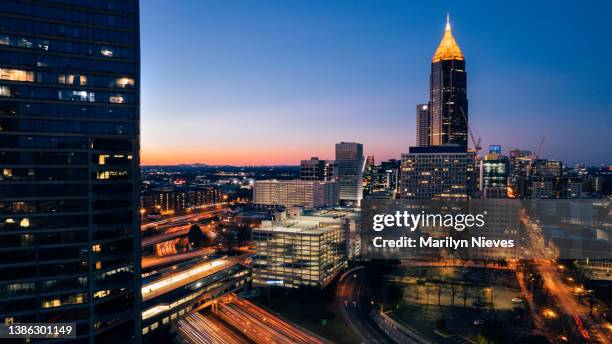 illuminated buildings in the atlanta skyline - atlanta georgia skyline stock pictures, royalty-free photos & images