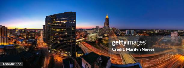 panoramic cityscape of atlanta ga - atlanta traffic stock pictures, royalty-free photos & images