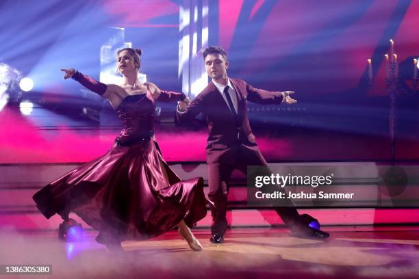 Mike Singer and Christina Luft perform on stage during the 4th show of the 15th season of the television competition show "Let's Dance" at MMC...