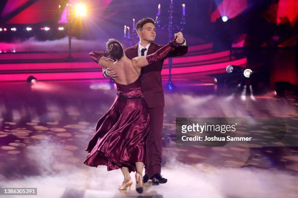 Mike Singer and Christina Luft perform on stage during the 4th show of the 15th season of the television competition show "Let's Dance" at MMC...