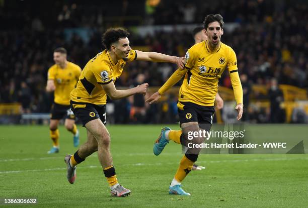 Francisco Trincao of Wolverhampton Wanderers celebrates with Rayan Ait-Nouri after scoring their side's second goal during the Premier League match...