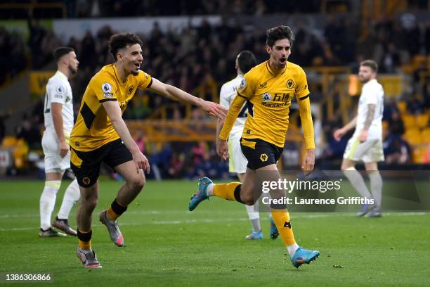 Francisco Trincao of Wolverhampton Wanderers celebrates with Rayan Ait-Nouri after scoring their side's second goal during the Premier League match...