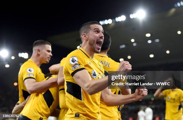 Conor Coady of Wolverhampton Wanderers celebrates their side's second goal scored by Francisco Trincao of Wolverhampton Wanderers during the Premier...