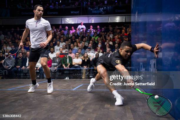 Mostafa Asal of Egypt plays a shot during the The Canary Wharf Squash Classic Final against Fares Dessouky of Egypt at East Wintergarden on March 18,...