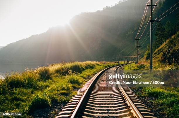 nature train,view of railroad tracks against sky - railroad track stock pictures, royalty-free photos & images