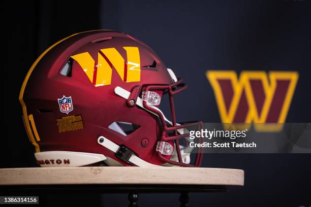 View of a Washington Commanders helmet on display during a press conference to introduce quarterback Carson Wentz at Inova Sports Performance Center...