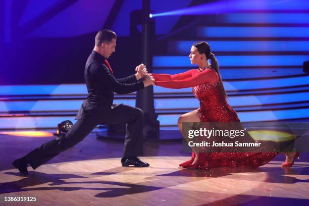 Caroline Bosbach and Valentin Lusin perform on stage during the 4th show of the 15th season of the television competition show "Let's Dance" at MMC...