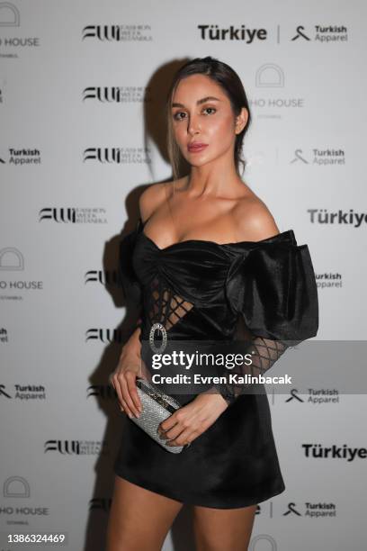 Guest attends Emre Erdemoglu show during Fashion Week on March 18, 2022 in Istanbul, Turkey.