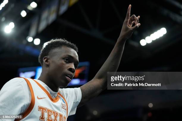Andrew Jones of the Texas Longhorns reacts while leaving the court after the Texas Longhorns defeated the Virginia Tech Hokies 81-73 during the first...