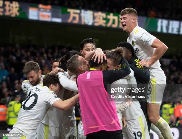 Luke Ayling of Leeds United celebrates scoring his team's third goal with team mates Dan James, Stuart Dallas, Sam Greenwood, Pascal Struijk, Adam...
