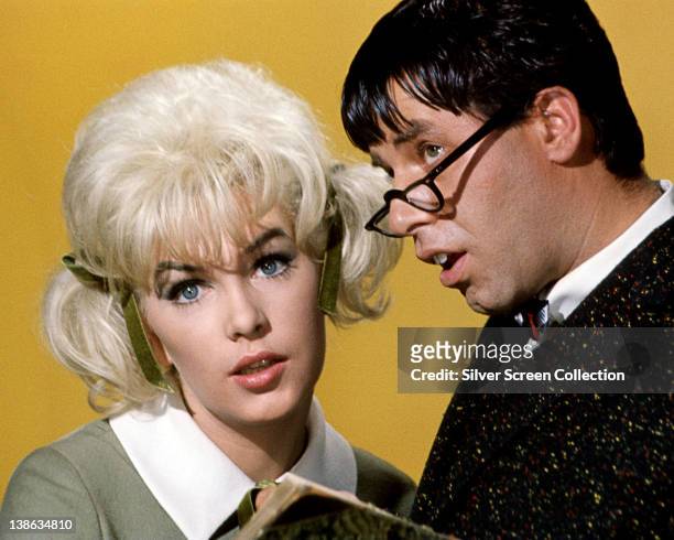 Stella Stevens, US actress, and Jerry Lewis, US actor and comedian, in a publicity image issued for the film, 'The Nutty Professor', USA, 1963. The...
