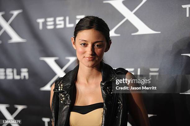 Model Caroline D'Amore arrives at Tesla Worldwide Debut of Model X on February 9, 2012 in Los Angeles, California.