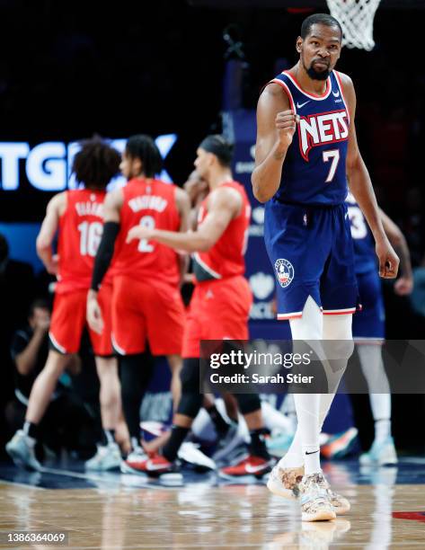 Kevin Durant of the Brooklyn Nets reacts during the second half against the Portland Trail Blazers at Barclays Center on March 18, 2022 in the...