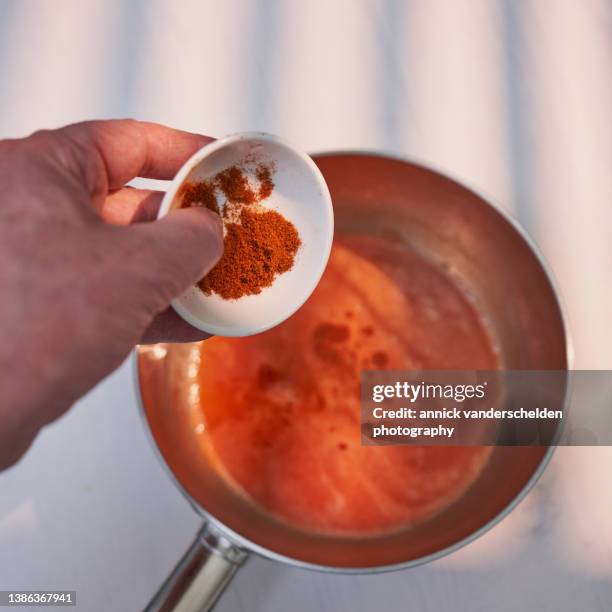 tomato sauce and cayenne powder - red pepper stock pictures, royalty-free photos & images