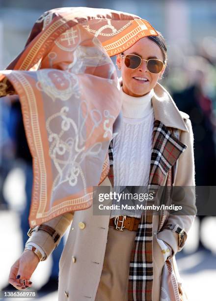 Jade Holland Cooper attends day 4 'Gold Cup Day' of the Cheltenham Festival at Cheltenham Racecourse on March 18, 2022 in Cheltenham, England.