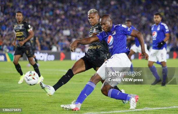 Andres Murillo of Millonarios fights for the ball against Marcelino Carreazo of Once Caldas during the match between Millonarios and Once Caldas as...