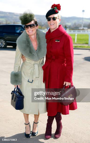 Dolly Maude and Zara Tindall attend day 4 'Gold Cup Day' of the Cheltenham Festival at Cheltenham Racecourse on March 18, 2022 in Cheltenham, England.