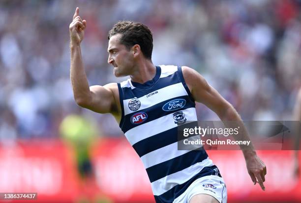 Luke Dahlhaus of the Cats celebrates kicking a goal during the round one AFL match between the Geelong Cats and the Essendon Bombers at Melbourne...