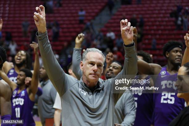 Head coach Jamie Dixon of the TCU Horned Frogs reacts following the victory against the Seton Hall Pirates in the first round game of the 2022 NCAA...