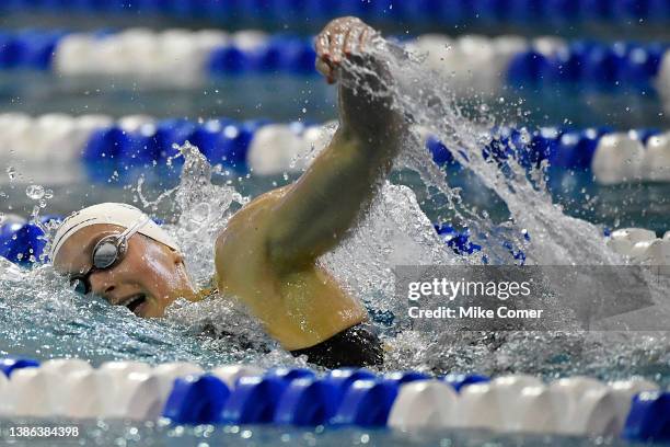 Alex Walsh of the Virginia Cavaliers swims the freestyle leg of the 400IM on her way to winning the event and setting a new pool record during the...