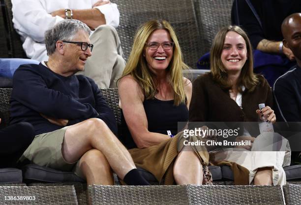 Bill Gates and actress Elisabeth Shue and daughter Agnes Charles Guggenheim watch Maria Sakkari of Greece plays against Paula Badosa of Spain in...
