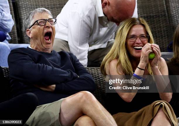 Bill Gates and actress Elisabeth Shue watch Maria Sakkari of Greece play against Paula Badosa of Spain in their semifinal match on Day 12 of the BNP...