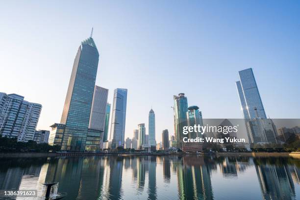 bottom view of wuhan skyscrapers - wuhan stock-fotos und bilder