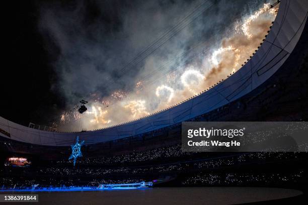 Fireworks explode during the Closing Ceremony on day nine of the 2022 Beijing Winter Paralympics at Beijing National Stadium on March 13, 2022 in...