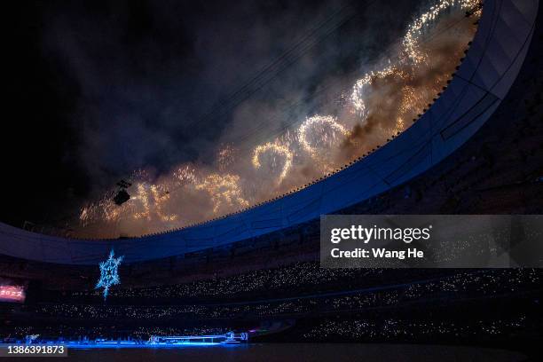Fireworks explode during the Closing Ceremony on day nine of the 2022 Beijing Winter Paralympics at Beijing National Stadium on March 13, 2022 in...