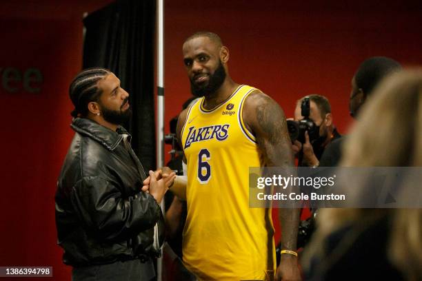 Drake and LeBron James of the Los Angeles Lakers talk after the NBA game between the Toronto Raptors and the Los Angeles Lakers at Scotiabank Arena...