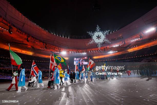 Flag bearers are seen during the Closing Ceremony on day nine of the 2022 Beijing Winter Paralympics at Beijing National Stadium on March 13, 2022 in...