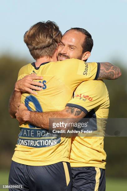 Marcos Urena of the Mariners celebrates his goal with Jason Cummings and team mates during the A-League Mens match between Central Coast Mariners and...