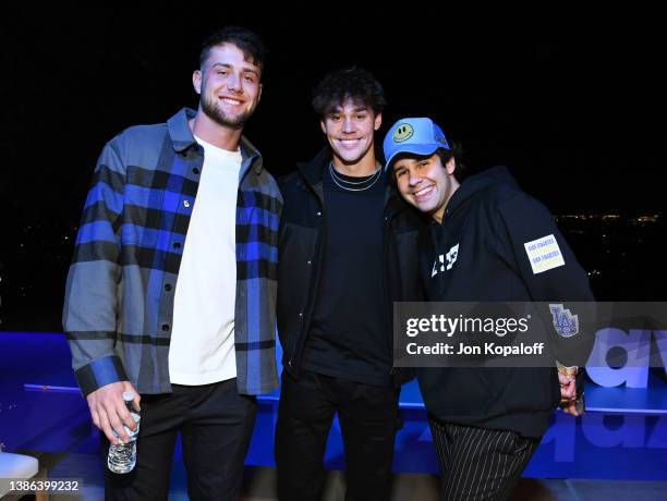 Harry Jowsey, Noah Beck and David Dobrik attend hoo.be fest hosted by David Dobrik on March 17, 2022 in Sherman Oaks, California.