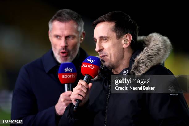 Gary Neville and Jamie Carragher , Ex footballers and sky sports pundits and presenters looks on during the Premier League match between...