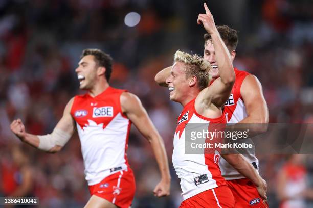Isaac Heeney of the Swans celebrates kicking a goal during the round one AFL match between the Greater Western Sydney Giants and the Sydney Swans at...
