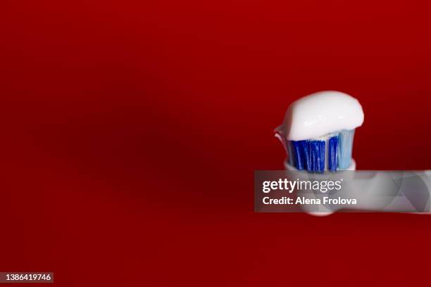 toothbrush with paste - 歯みがき粉 ストックフォトと画像