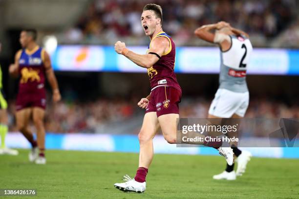 Lincoln McCarthy of the Lions celebrates a goal during the round one AFL match between the Brisbane Lions and the Port Adelaide Power at The Gabba on...