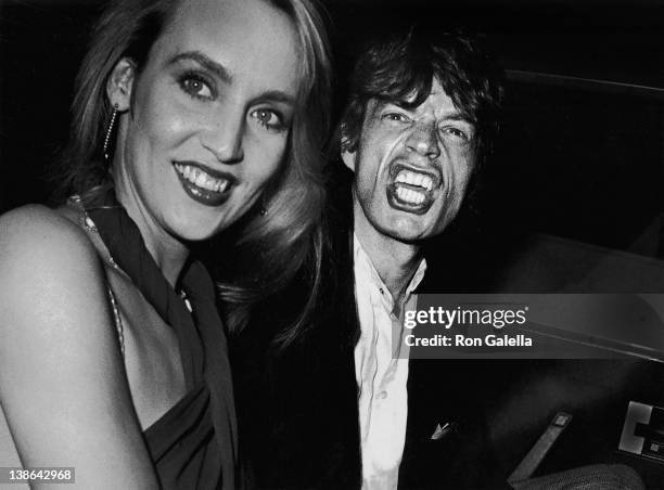 Jerry Hall and Mick Jagger attend the party for Reid Rogers on September 19, 1984 at Limelight in New York City.