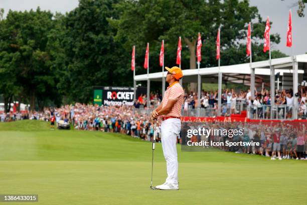 Golfer Rickie Fowler reacts to making the winning birdie putt on the 18th hole during a playoff on July 2 during the final round to win the Rocket...