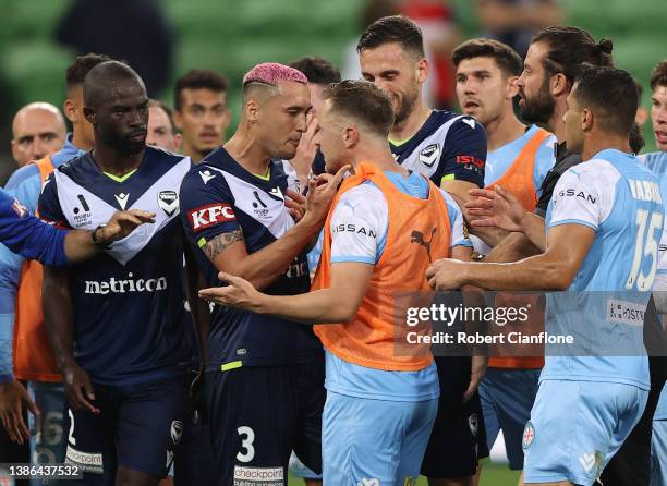 Players exchange words after the final whistle during the A-League Mens match between Melbourne City and Melbourne Victory at AAMI Park, on March 19...