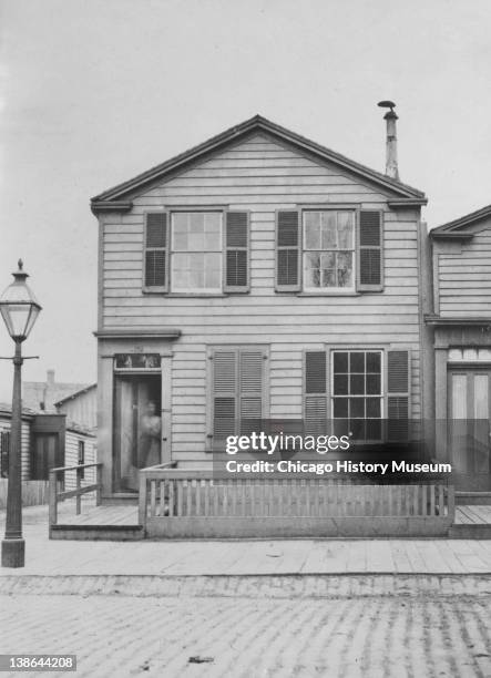 View of residence at 42 Monroe Street, Chicago, Illinois, late 1860s.
