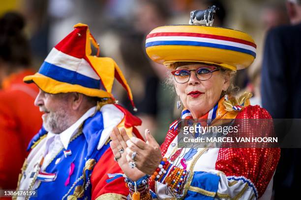 Supporters gesture during the friendly football match between the Netherlands and Belgium at The Parkstad Limburg Stadium in Kerkrade on July 2,...