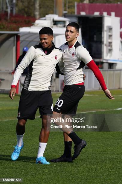 Emil Roback and Marko Lazetic of AC Milan U19 speak during warm up prior the match between AC Milan U19 and Verona U19 at Campo Sportivo Vismara on...