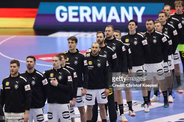 The team of Germany stands for the national anthem during the international handball friendly match between Germany and Hungary at Schwalbe Arena on...