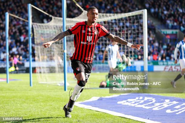 Jaidon Anthony of Bournemouth celebrates after he scores a goal to make it 1-0 during the Sky Bet Championship match between Huddersfield Town and...