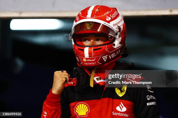 Pole position qualifier Charles Leclerc of Monaco and Ferrari celebrates in parc ferme during qualifying ahead of the F1 Grand Prix of Bahrain at...