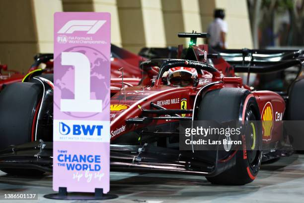 Pole position qualifier Charles Leclerc of Monaco and Ferrari stops in parc ferme during qualifying ahead of the F1 Grand Prix of Bahrain at Bahrain...