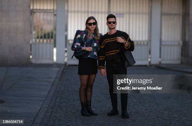 Aline Kaplan is seen wearing Celine shades, Polene Paris black bag, Isabel Marant Etoile shoulder padded colorful jacket, Massimo Dutti black cowboy...