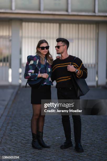 Aline Kaplan is seen wearing Celine shades, Polene Paris black bag, Isabel Marant Etoile shoulder padded colorful jacket, Massimo Dutti black cowboy...